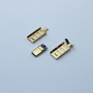 disassembled USB-C gold on white background