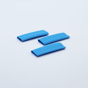 3 pieces of blue heat-shrink on a white background
