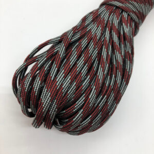 Red and Silver coloured paracord on a white background